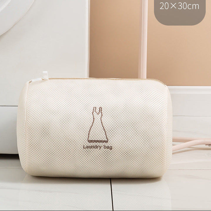 Beige laundry bag with a logo on a white background