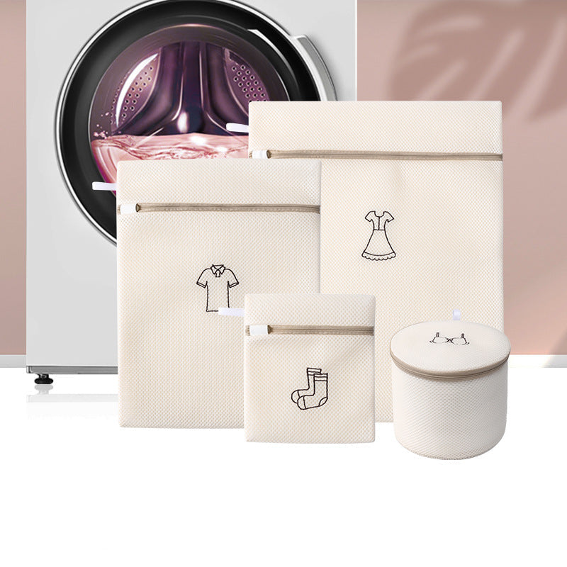 Set of laundry bags and a container with a washing machine in the background