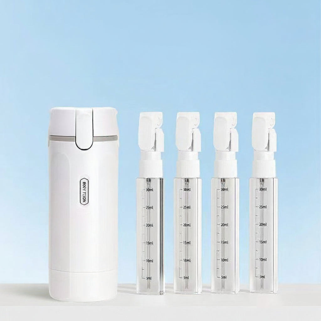 Set of white travel dispenser bottle with measurement markings on a light blue background